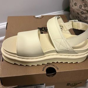 Dr. Martens light yellow sandals.  Never worn, new in box.